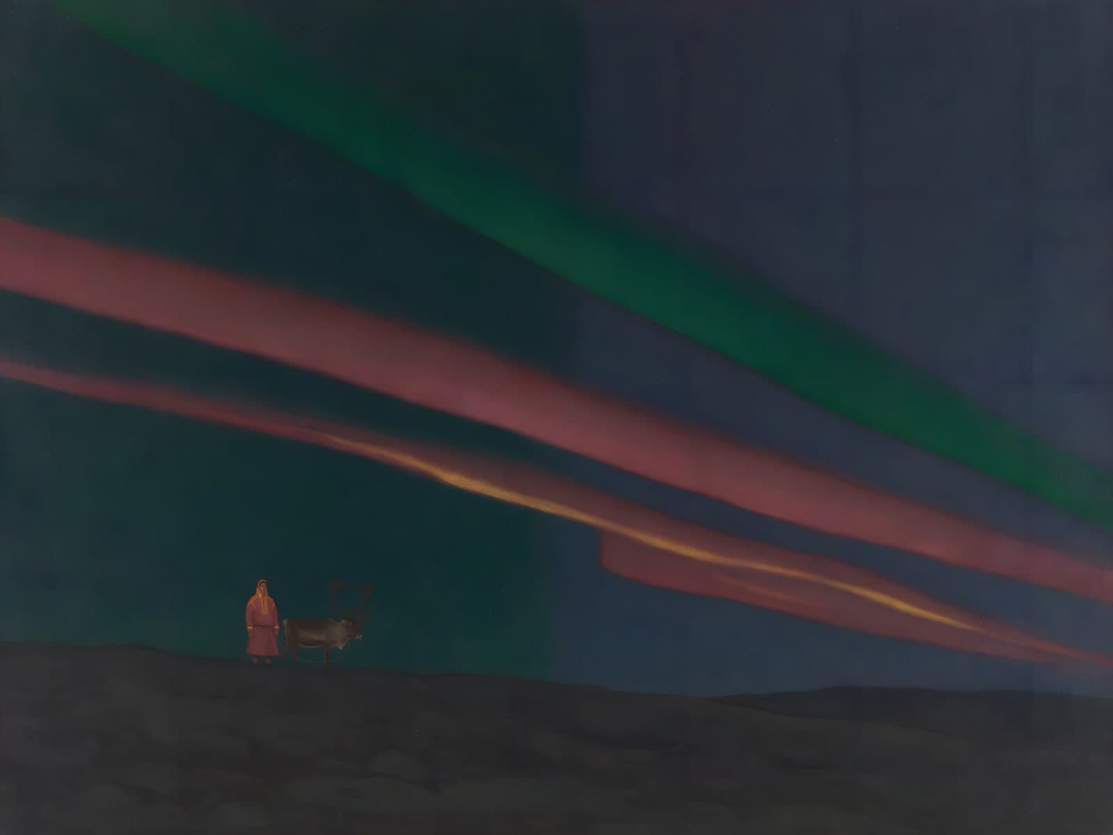 Rode en groene lichtbanen boven donker land