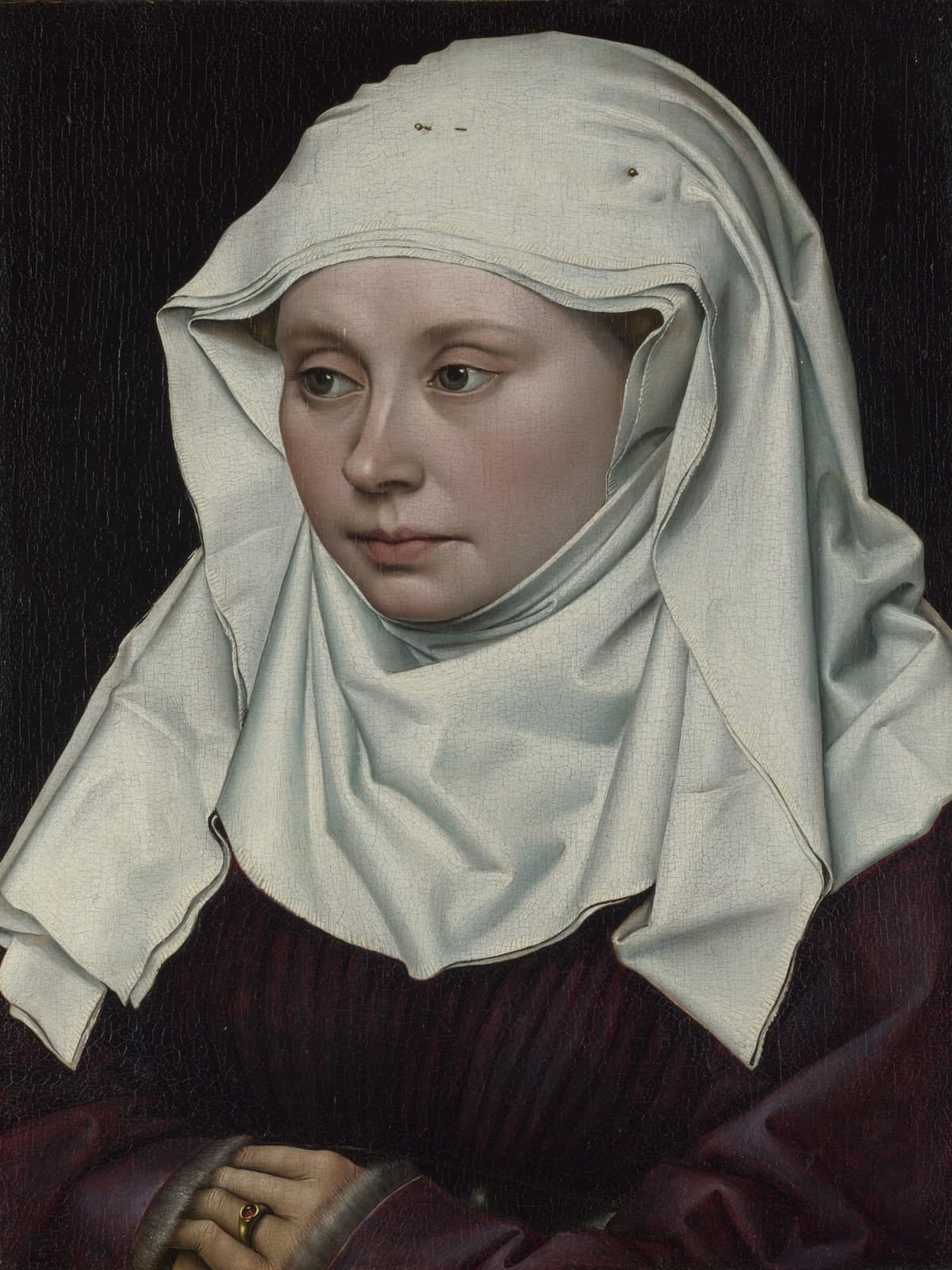Portret van een vrouw met een witte doek