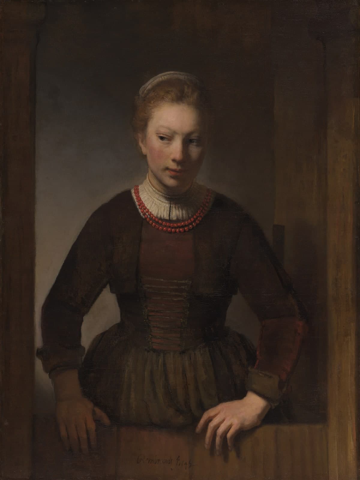 Jonge vrouw bij een open onderdeur