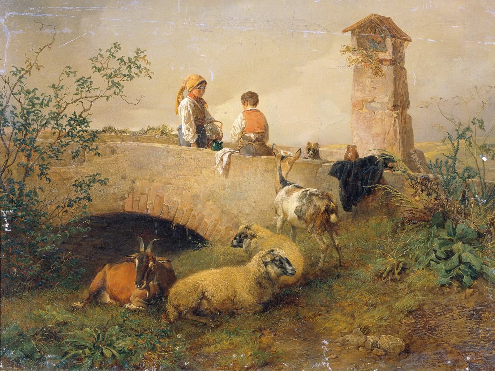 Jongen en meisje met schapen en geiten