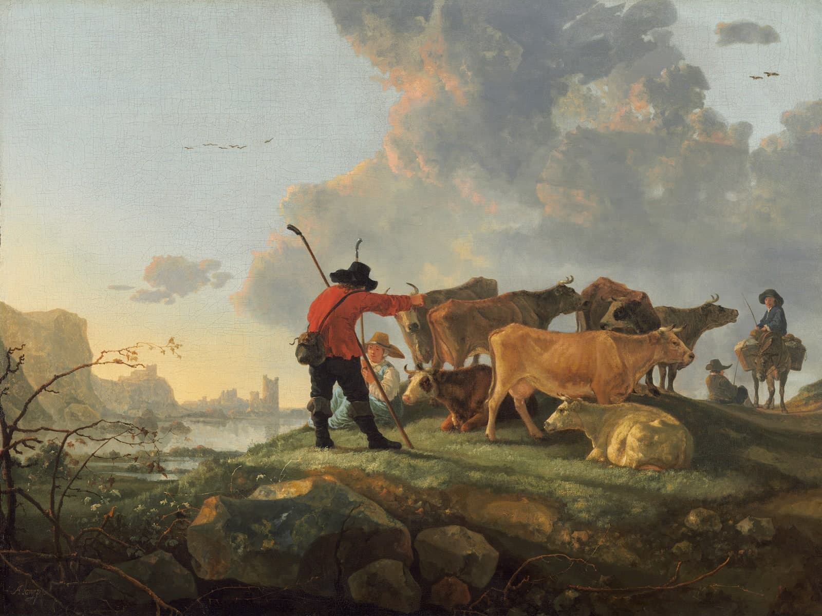 Herders en vee op de rivieroever