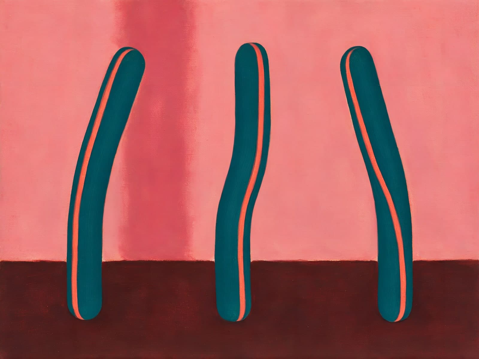 Drie groenblauwe vormen op een roze wand