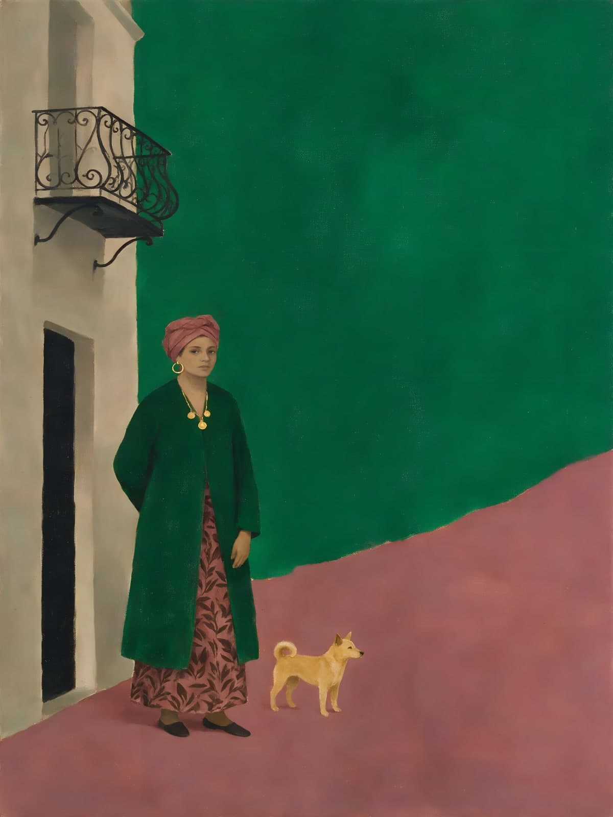 Vrouw in groene jas met gele hond