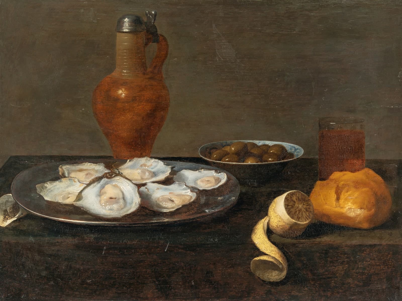 Stilleven met oesters, citroen en olijven