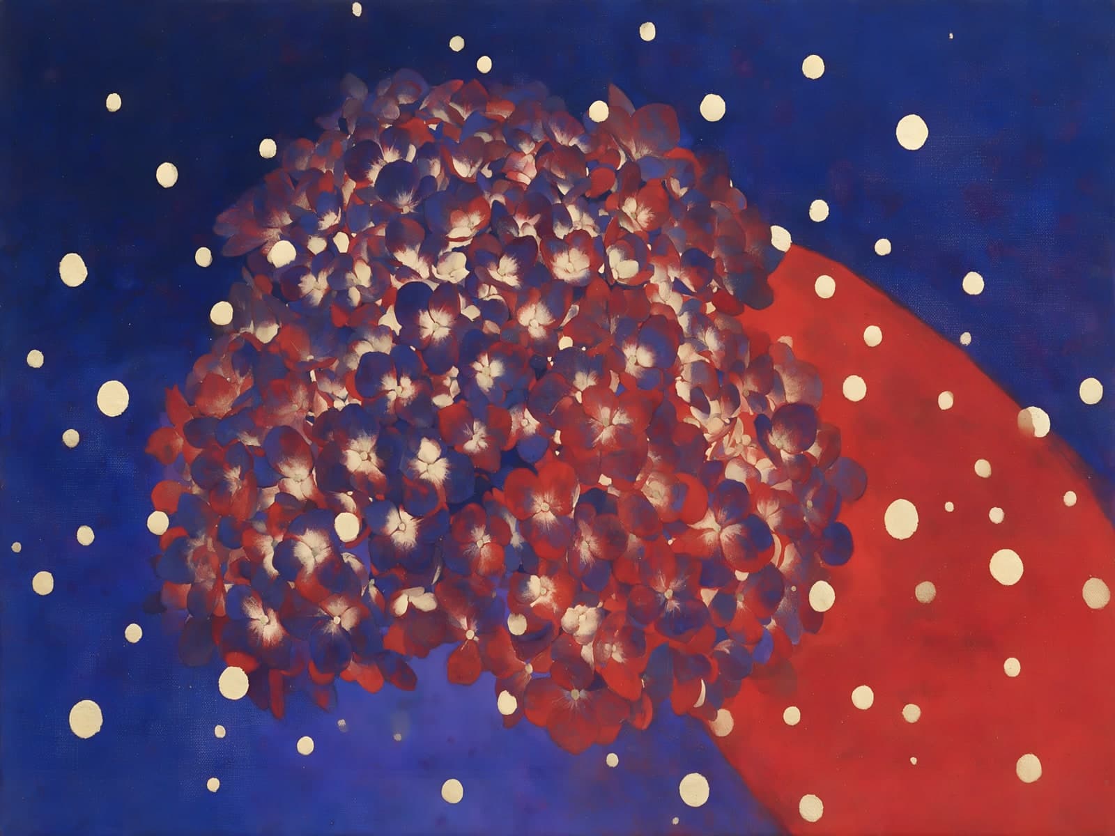 Bloemenbol in blauw en rood met stippen