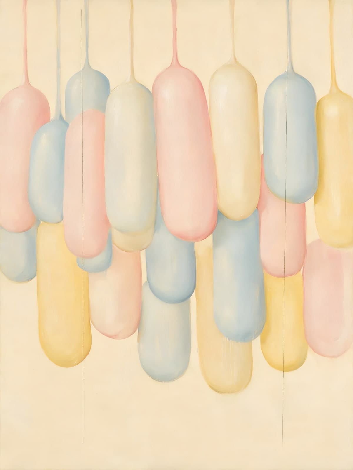 Hangende pastelkleurige vormen in roze en blauw