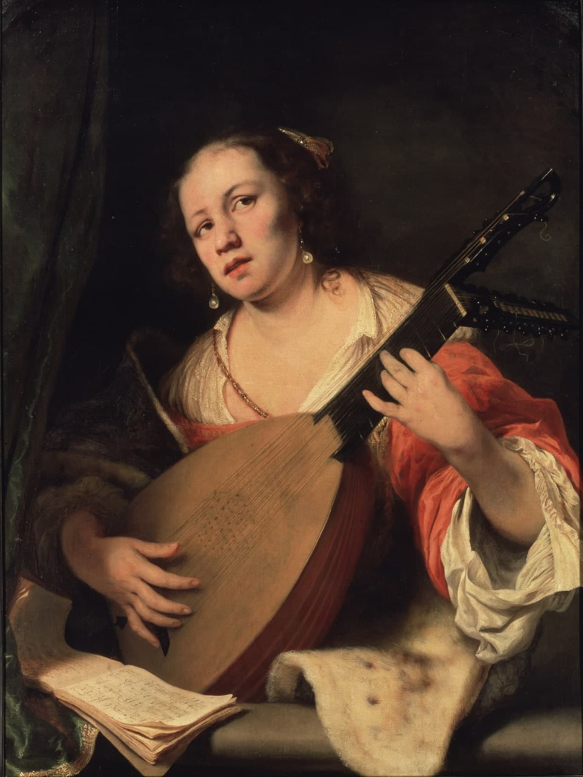 Luitspelende dame